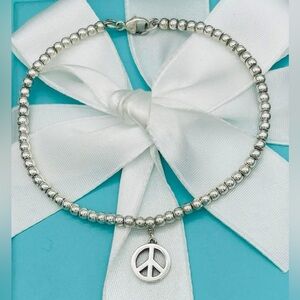 Tiffany & Co. Peace Sign Bead Bracelet